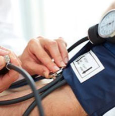 Nurse checking blood pressure